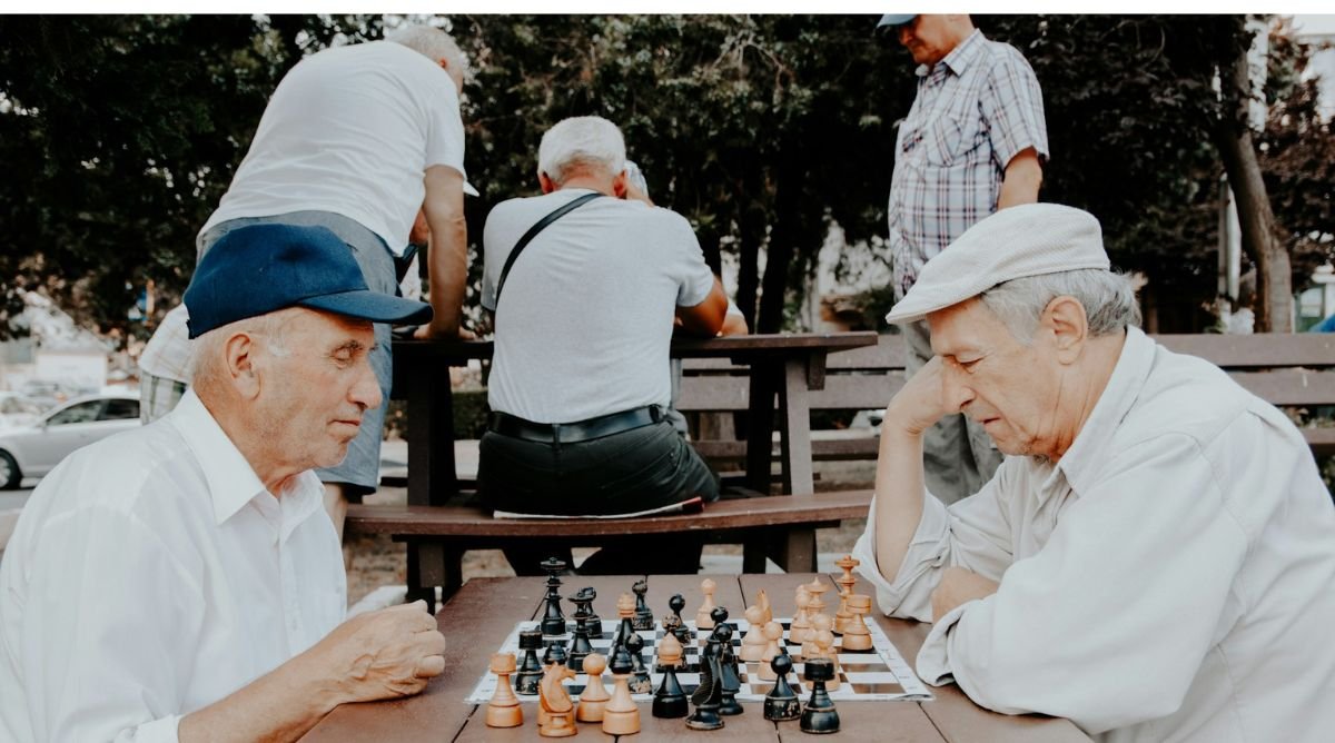 old people playing chess